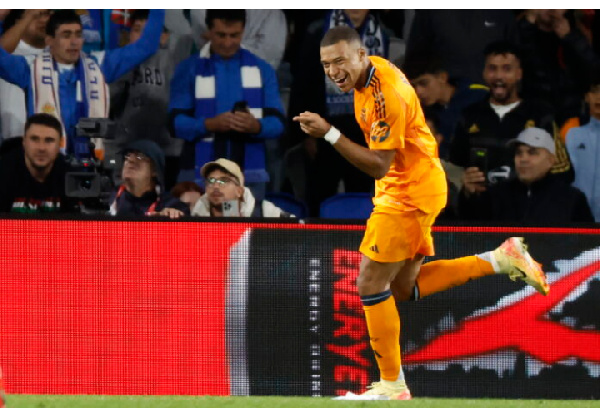 Kylian Mbappe celebrates after scoring the 0-2 goal during the Spanish LaLiga soccer match