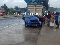 Ruins of the Covid-19 pickup after a crash into a stationary trailer truck