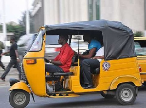 Tricycle rider with passengers