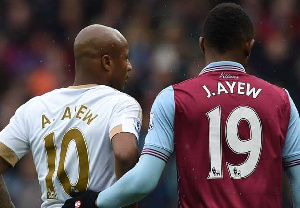 Andre Ayew with Jordan Ayew