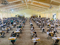 Some students in an examination hall