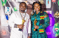 Quophi Okyeame with his wife Stacy Amoateng after receiving their awards