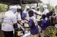 Pupils receiving their meals