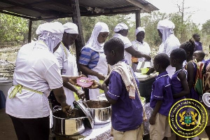 Pupils receiving their meals