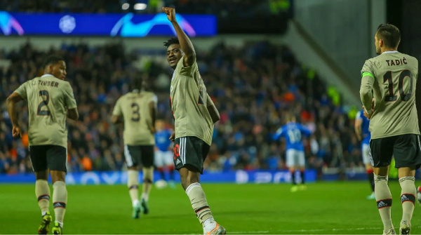 Ajax midfielder, Kudus Mohammed celebrating his goal against Rangers