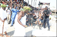 A priest performing rites at the festival