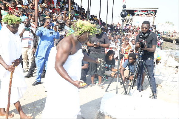 A priest performing rites at the festival