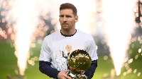 Lionel Messi with his Ballon d’Or