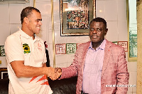 Steve Pollack in a hand shake with Dr Kwame Kyei