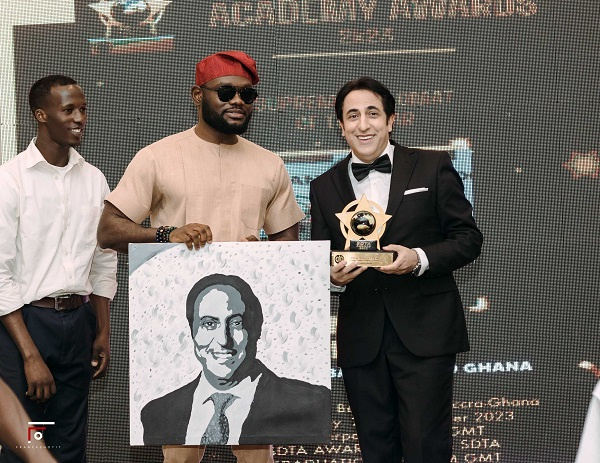 Maher Kheir, Lebanon Ambassador, right, with his awards