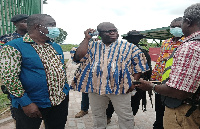 The Consultant (Right) explaining to the Minister (Left) and other officials