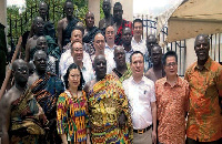 The Okyenhene in a pose with the Chinese Ambassador and others