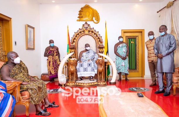 Otumfuo Osei Tutu II meeting visitors at Manhyia