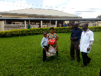 11-year-old Ohene Kwaku and his mother after the drone delivery.