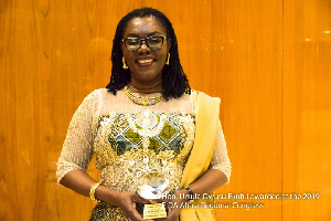 Ursula Owusu-Ekuful, Communications Minister holding her award