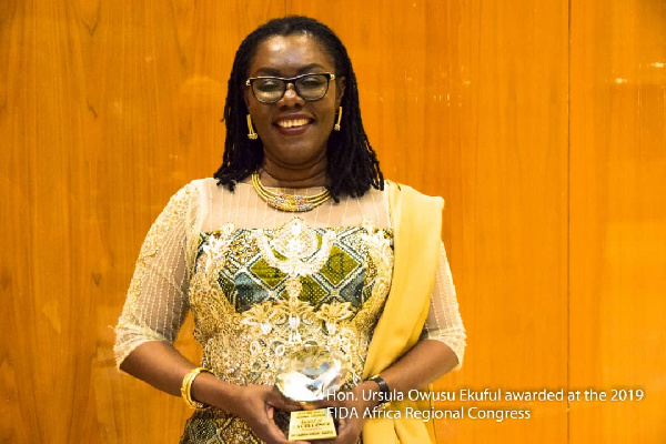 Ursula Owusu-Ekuful, Communications Minister holding her award