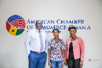 Francisca shares a photo with some workers at the Chamber