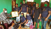 Some members of Peki Rivet Association in a group photograph with the chief