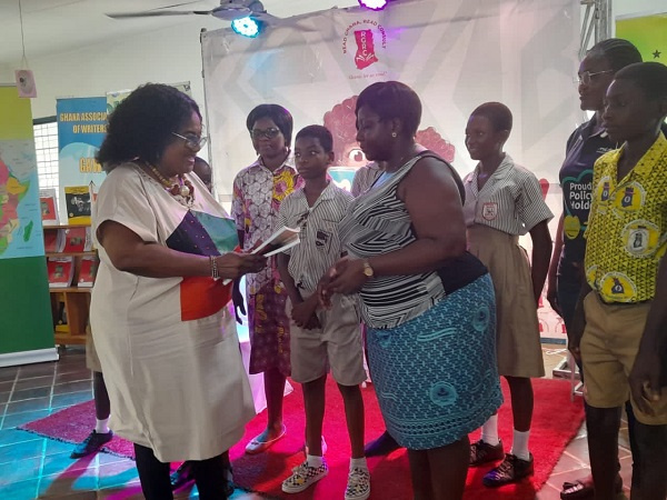 Some members of the Ghana Association of Writers with students