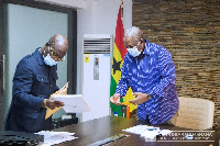 John Dramani Mahama receives the manifesto from the team