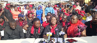 A photo of Kumasi traders at a press conference