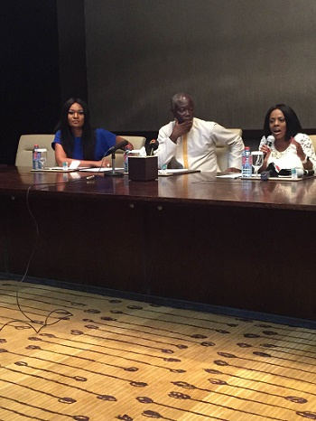 Sports Minister flanked by Nana Aba and Sandra Ankobea