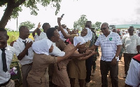 Former  President John Mahama with some nurses