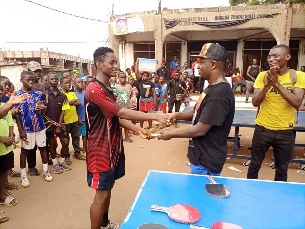 A participant receiving his award