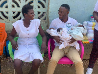 The teenage mother with Isaac Debrah Bekoe and the triplets