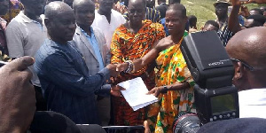 Major Oduro handing over the site plan