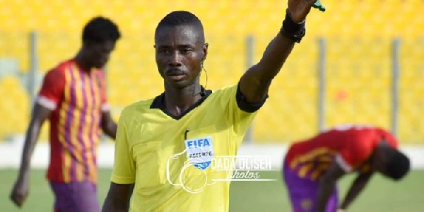 Referee Charles Benle Bulu