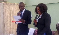 Ernest Arthur [L] taking the oath of office