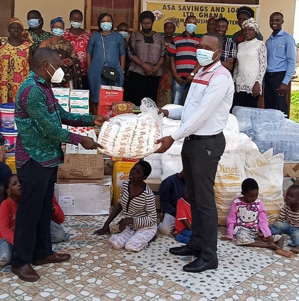 Sunyani Area Manager for ASA Savings and Loans presenting the items