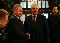 Gen Haftar (R) shook hands with Russian Defence Minister Sergei Shoigu, but not his rivals