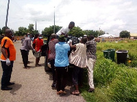 The body of the deceased being deposited in a car