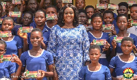 Lawyer Oteng-Gyasi, MP for  Prestea Huni-Valley in a group photo with the children