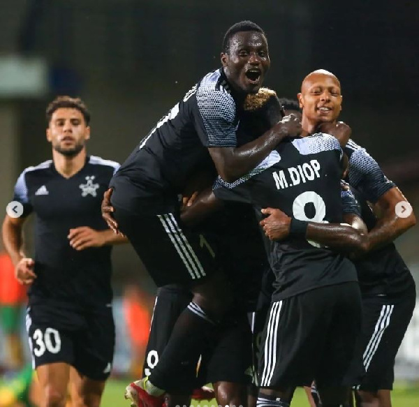 Midfielder Mudasiru Salifu with colleagues