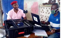 Bernard Mornah, National Chairman of the PNC registering for his voters card