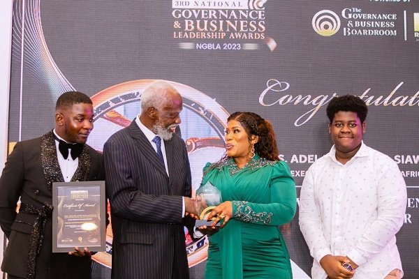 Adelaide A. Siaw-Agyepong receiving the award