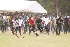 The students chasing after the referee