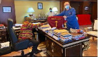 President Akufo-Addo receiving a replica jersey of AS Roma