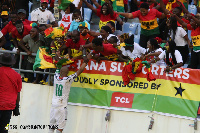 Dede Ayew celebrates his goal with the fans