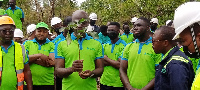 Mr. Samuel Kofi Dzamesi and some staff of BPA planting trees