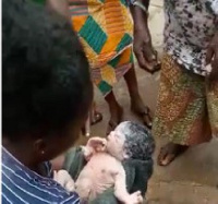 The timely intervention of a passerby and other members of the community saved the baby from dying