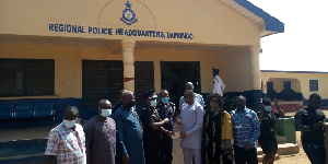 Savannah regional minister Saeed Jibril Muhazu presenting money to the regional police headquarters