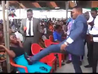 File photo: Bishop Daniel Obinim steps on the abdomen of a pregnant woman.