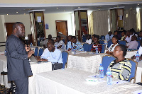 Kwame Baah-Acheamfour addressing participants at the meeting