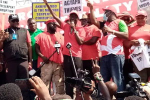 Leading members of the NDC addressing party supporters at the 'Probity and Accountability' march