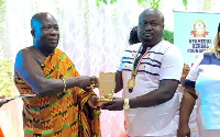 Dr Kennedy Owusu Agyemang, CEO of Kenoga Company Limited receiving the award