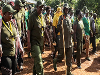 Ugandan President Yoweri Museveni (front 3rdR) walks during the first day of a 6-day trek